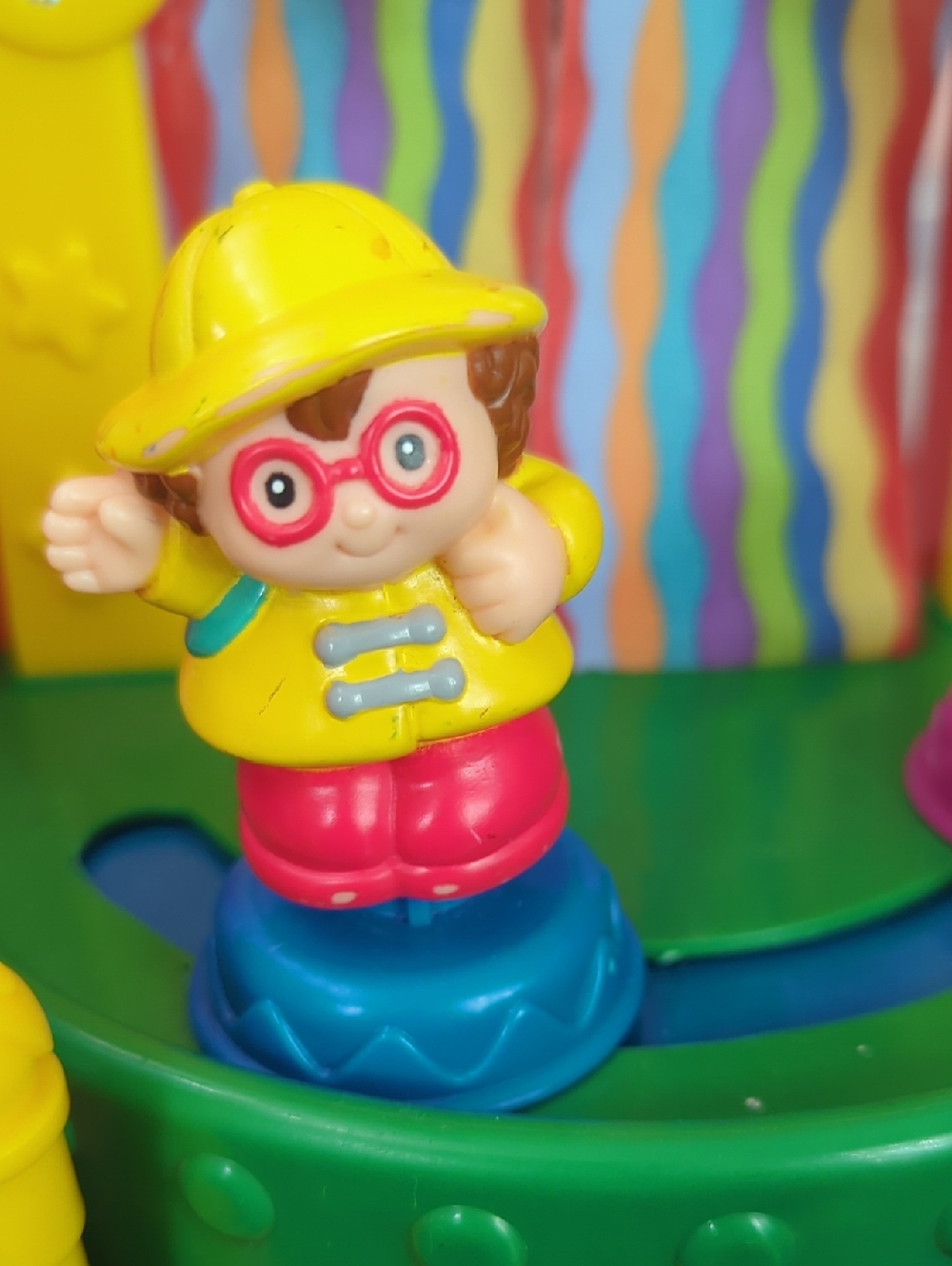 Little People - Maggie - Yellow Raincoat Play Figurine with Red Glasses